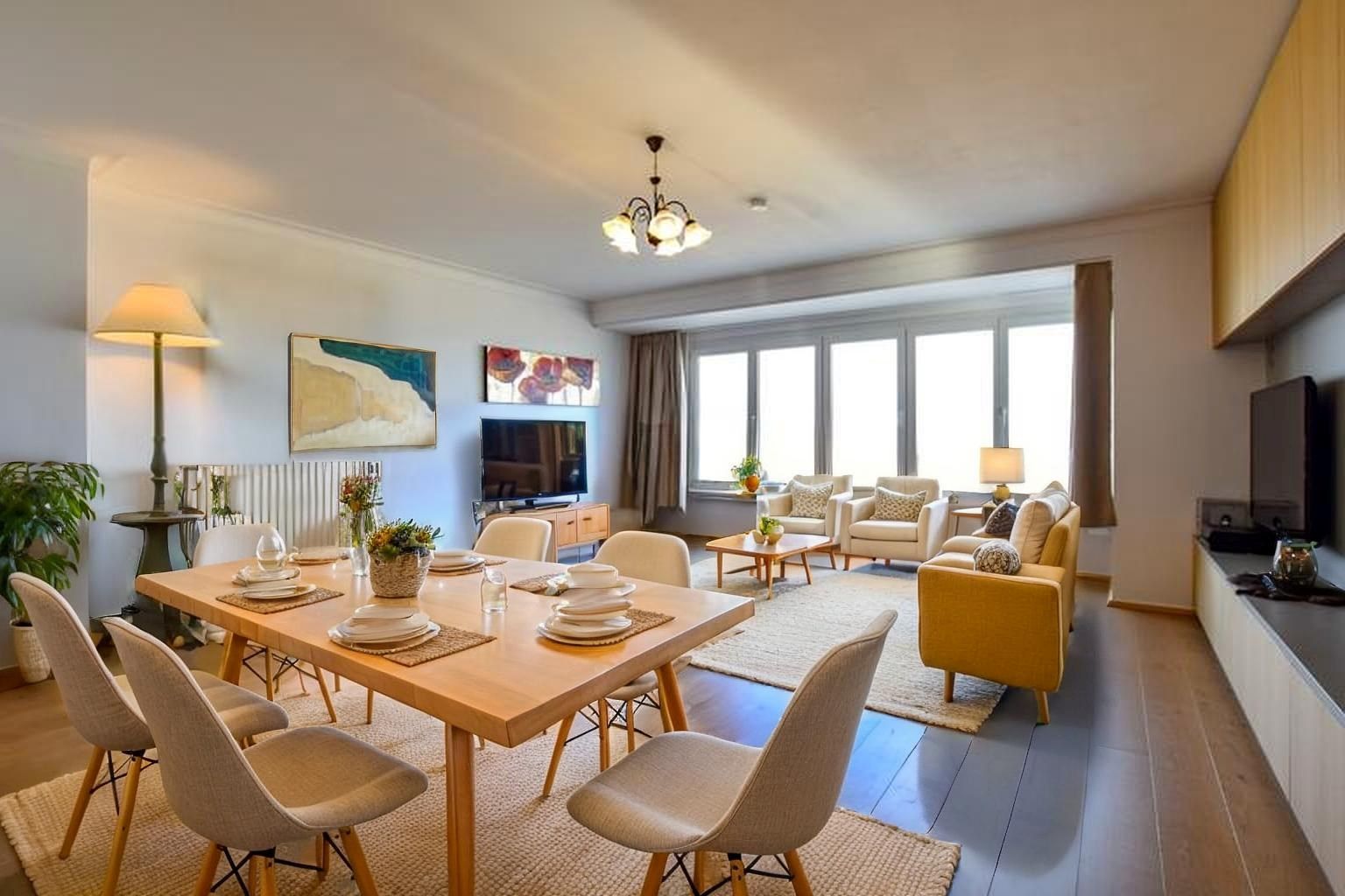 INSTAPKLAAR appartement (88m²) met FRONTAAL ZEEZICHT en 2/3 slaapkamer op de zeedijk te Koksijde-Bad. foto {{pictureIndex}}