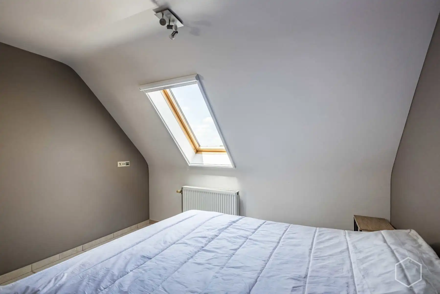 Lichtrijk duplexappartement met 4 slaapkamers en airco's foto 24