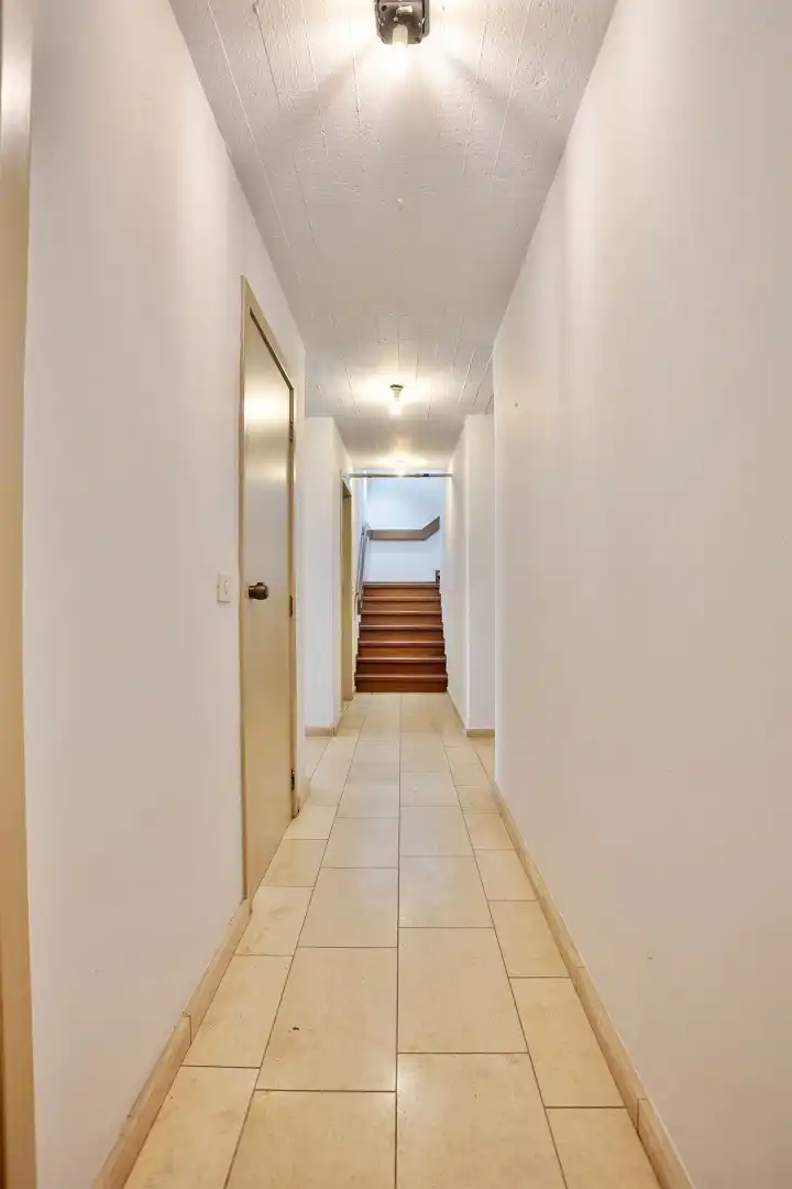 Ruime woning in een doodlopende straat met 4 slaapkamers, 2 badkamers op een prachtig perceel vlak bij het Meerdaalwoud  foto 24