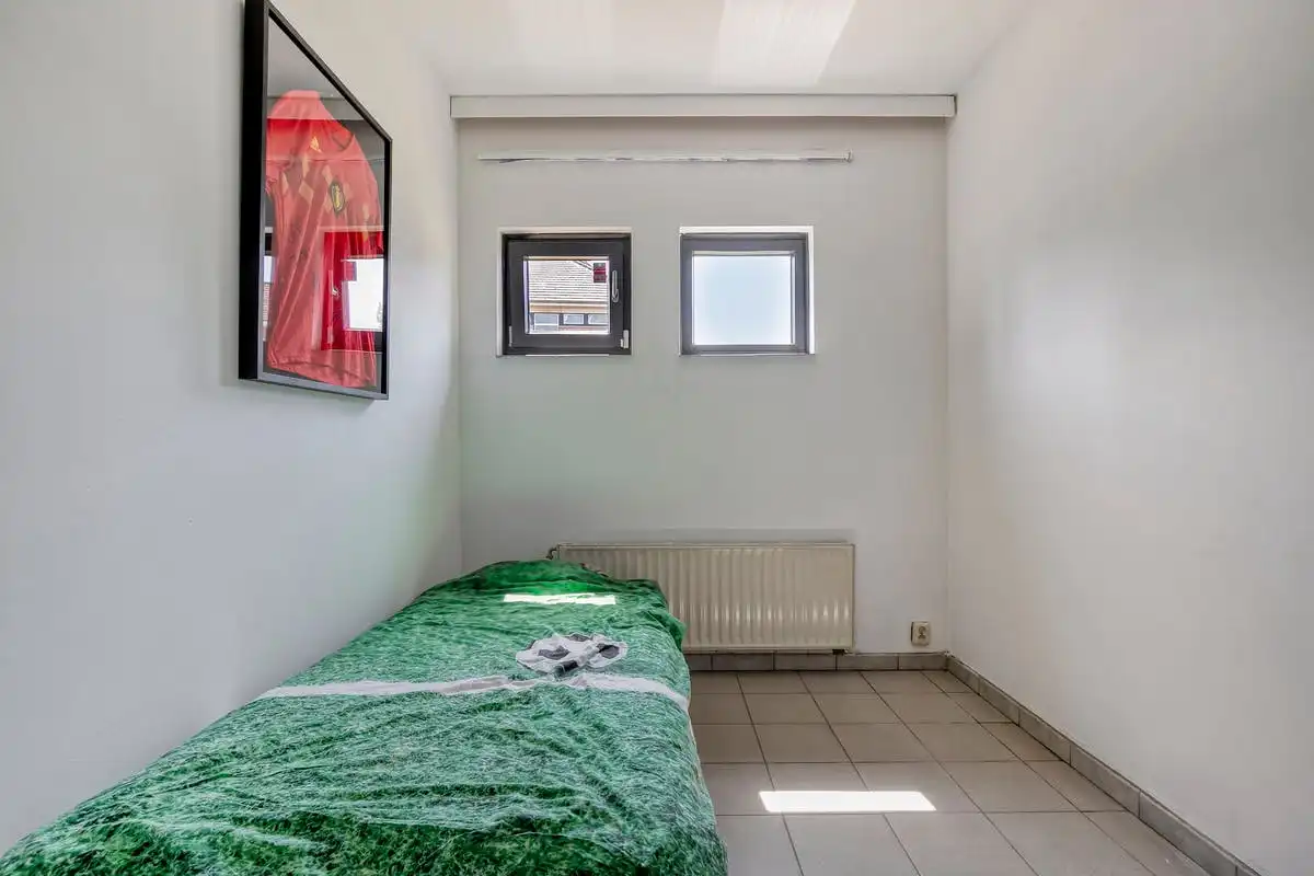Duplex appartement op uitstekende ligging in Humbeek met ruime tuin en parkeermogelijkheden foto 13