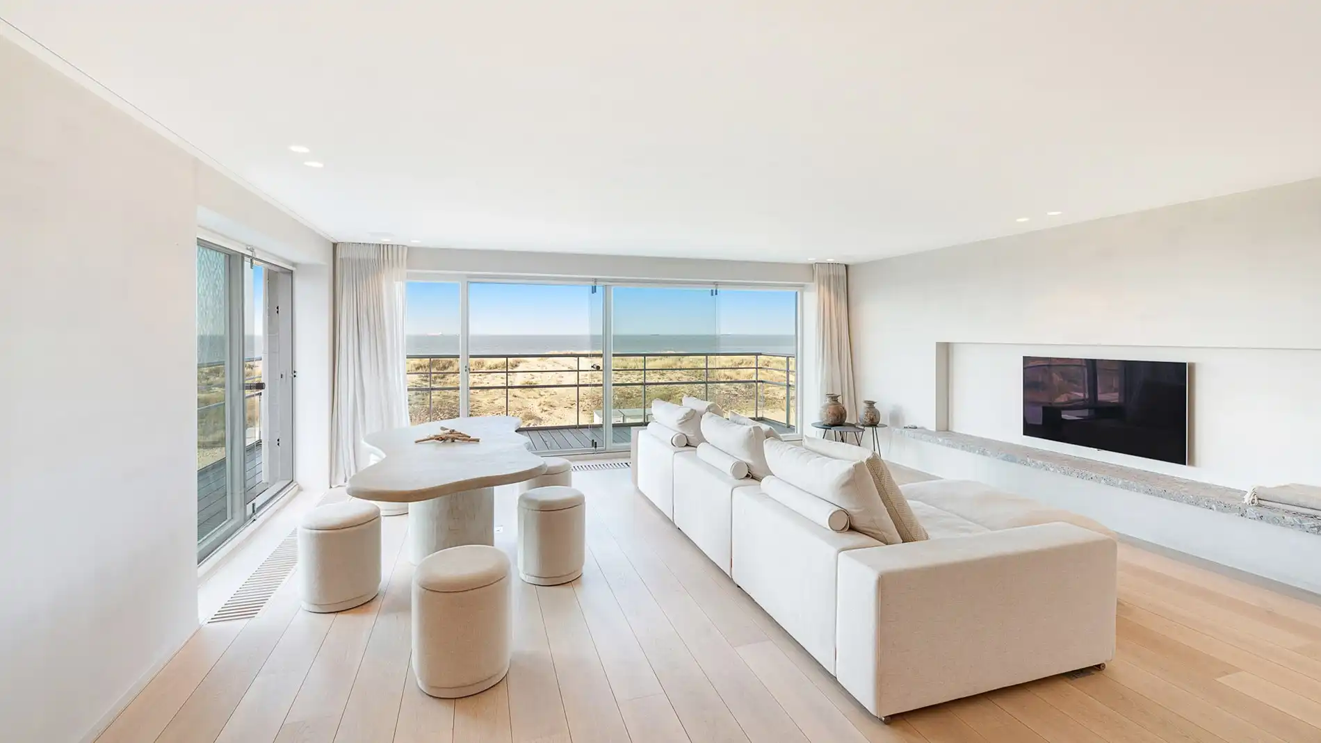 Uitzonderlijk hoekappartement met adembenemend zee-en duinenzicht langs de Wandeldijk in het Zoute foto 4