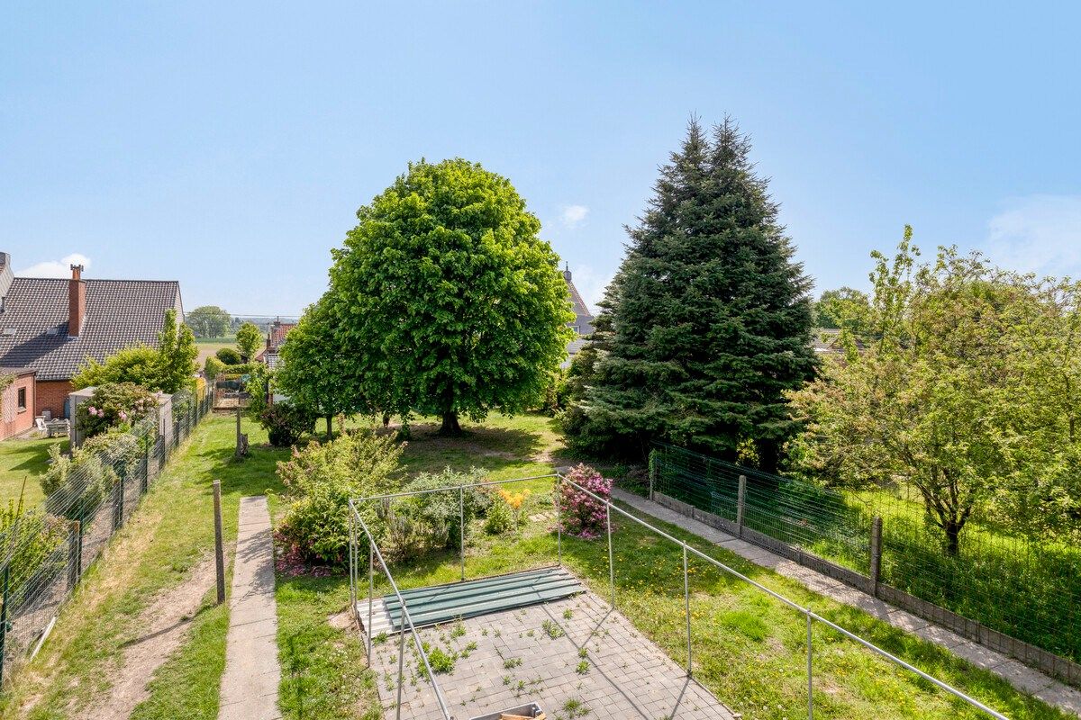 Te renoveren woning met naastliggend bouwperceel! foto 17