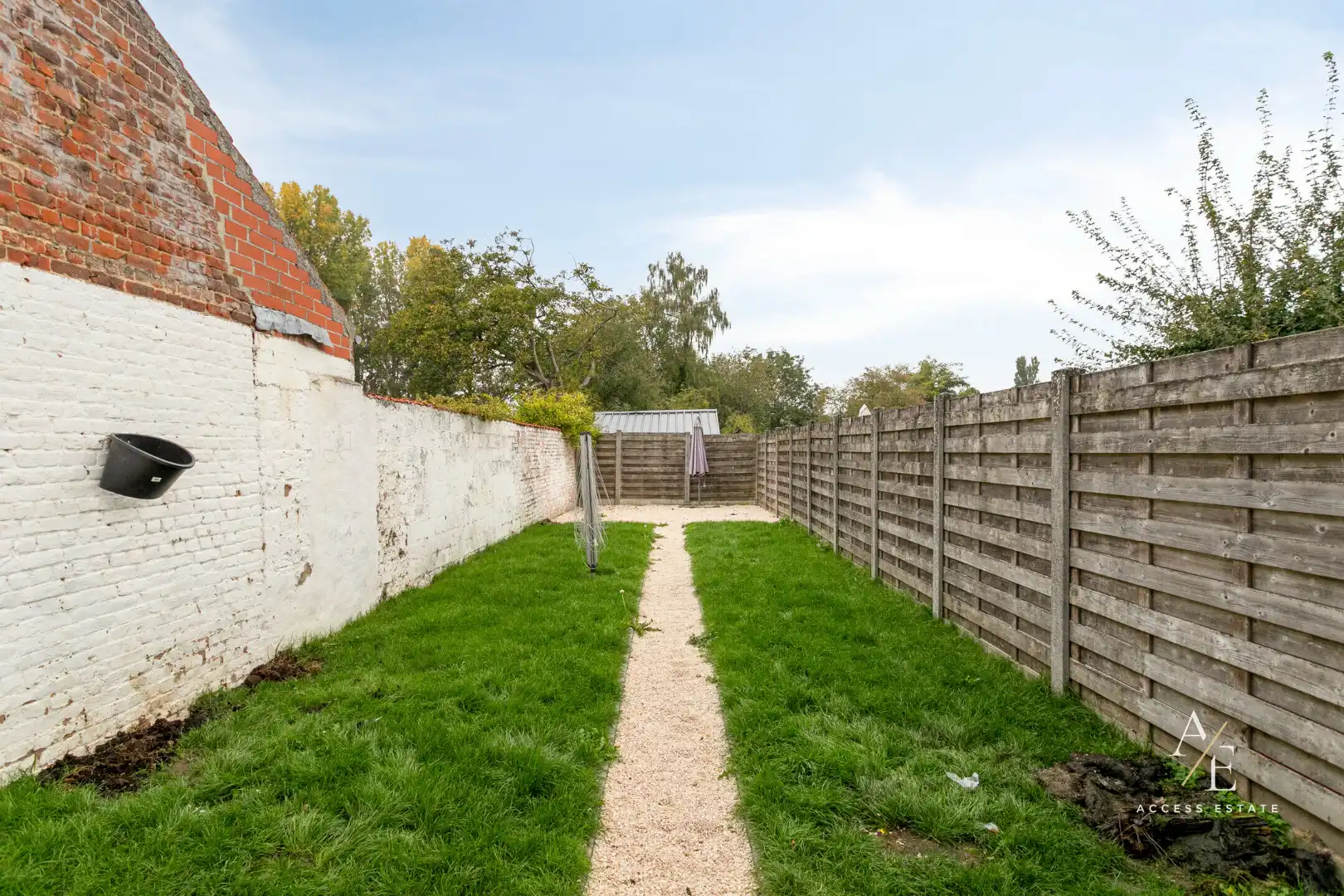 CENTRAAL GELEGEN WONING MET 3 (+2) SLAAPKAMERS EN AFGESLOTEN TUIN IN WEVELGEM foto 7