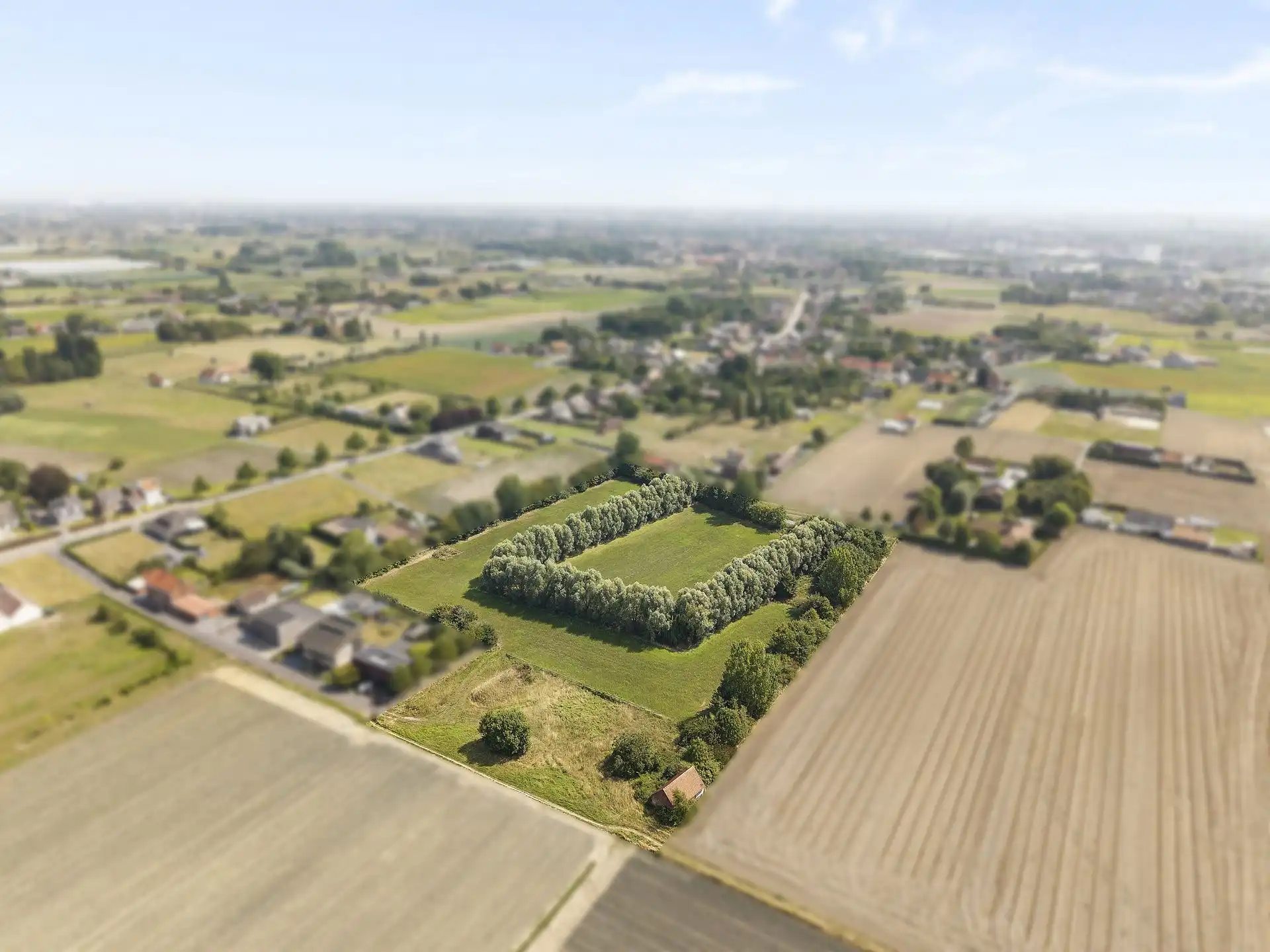 Unieke bouwgrond van 3300m2 + 2 hectare omheinde weide/tuin foto 2