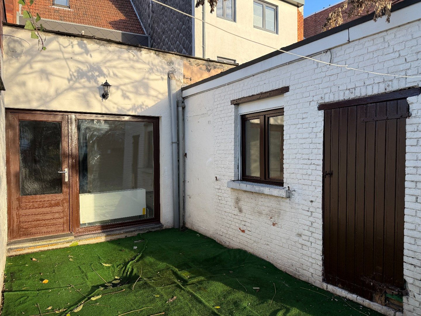 Verzorgd gelijkvloers 1-slpk appartement met tuin foto 17