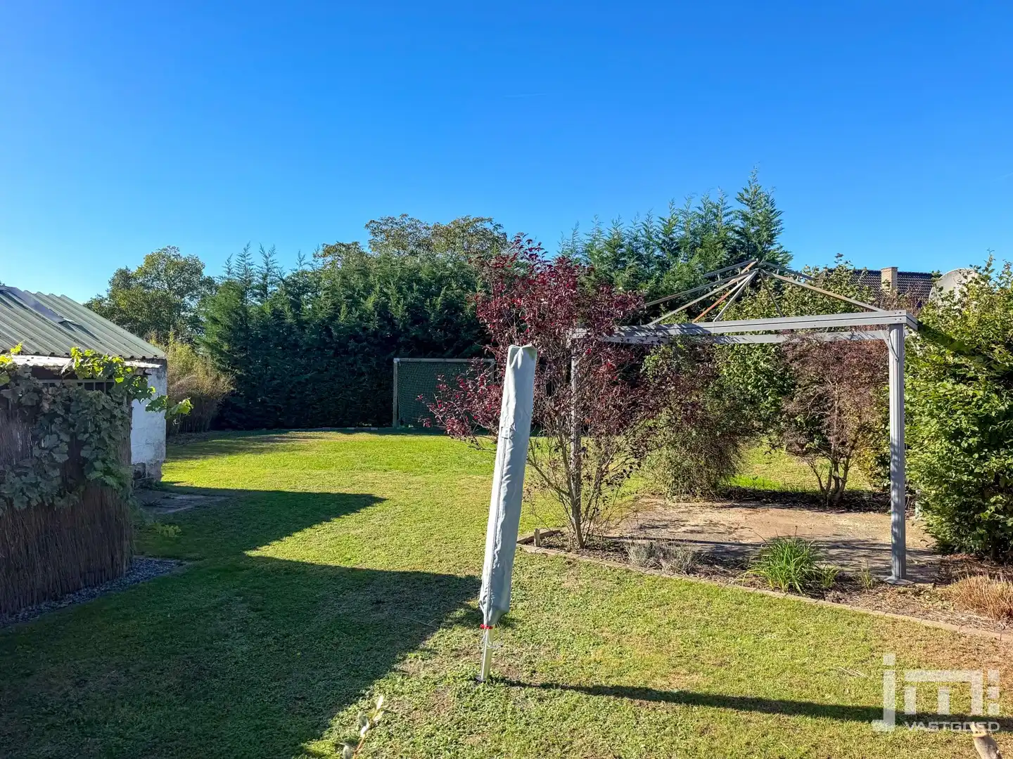 Rustig gelegen, instapklare gezinswoning met 3 slaapkamers en mooie tuin foto 13