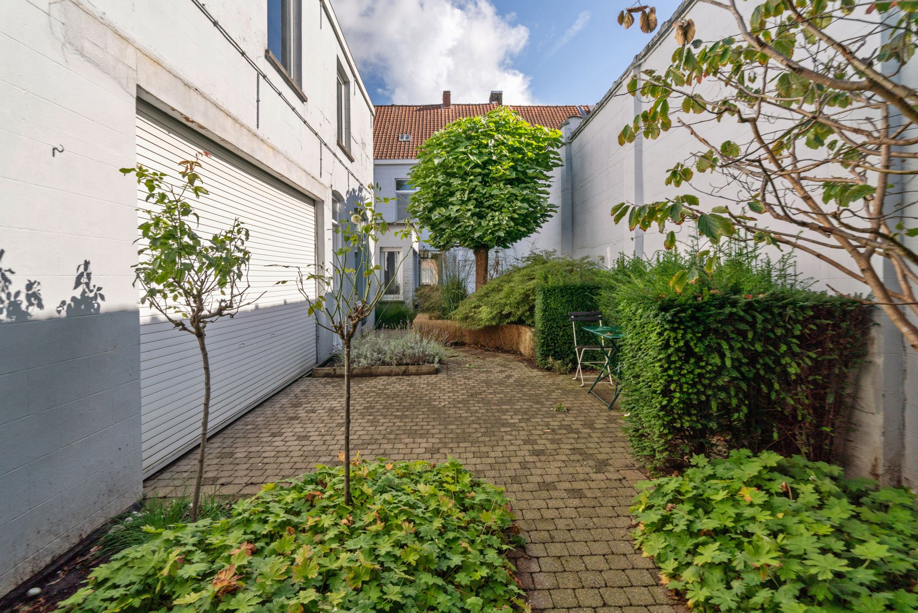 Karaktervolle ruime woning  met bijgebouw/atelier en stadstuin in het centrum foto 24