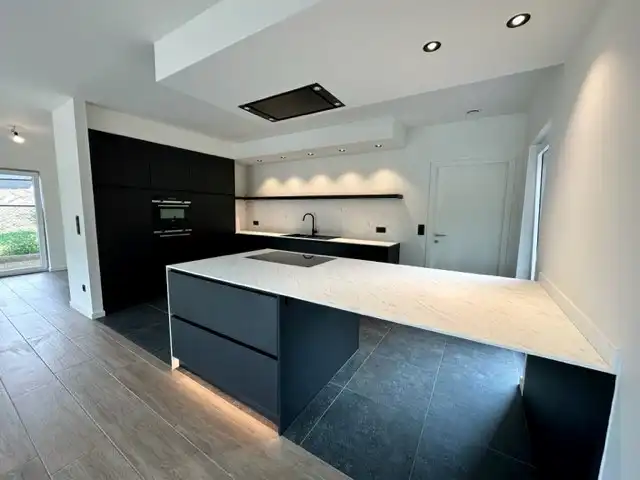 Comfortabele, hoog afgewerkte en energiezuinige nieuwbouwwoning gelegen in een rustige omgeving in Neeroeteren.  foto 9