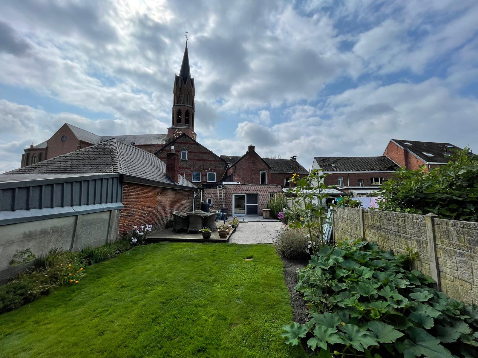 3 slpk en tuin onder kerktoren foto 20