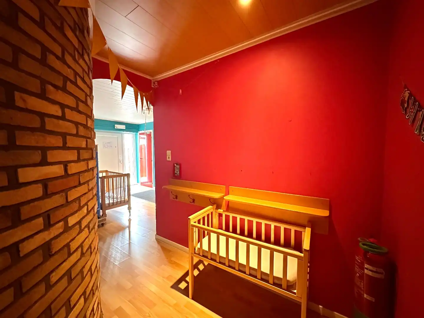 Veelzijdig handelshuis met ruime tuin – momenteel ingericht als crèche foto 8