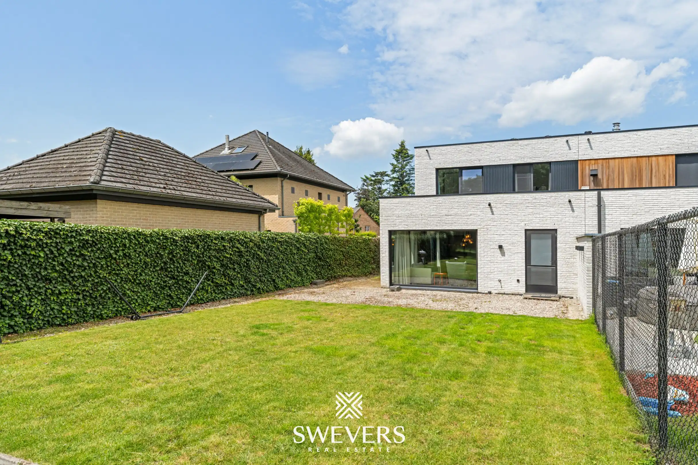 Recente halfopen bebouwing met 5 slaapkamers met verrassend grote tuin in Houthalen foto 25