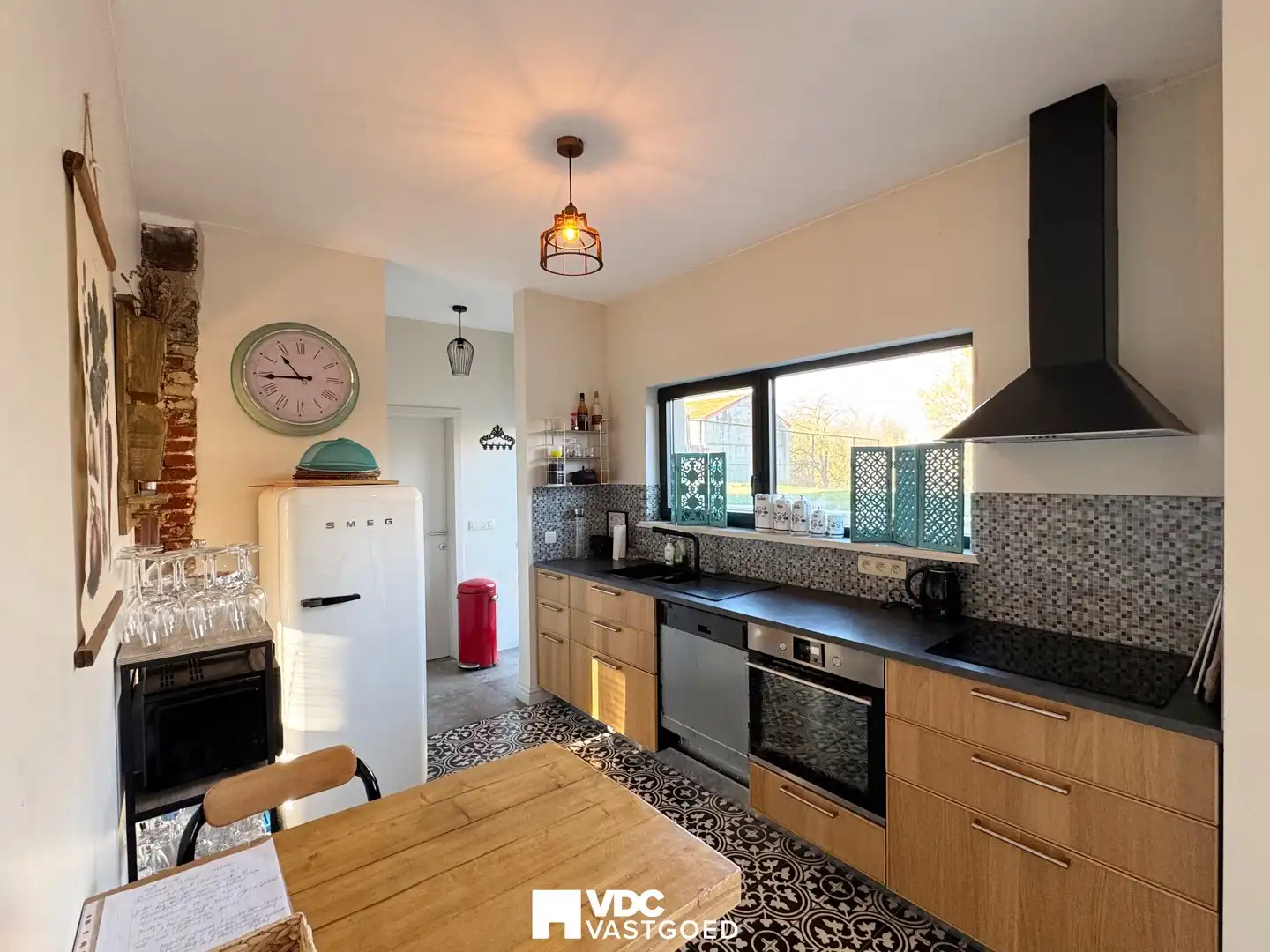 Charmante gerenoveerde woning met tuin in Klein-Gelmen (Heers) foto 7