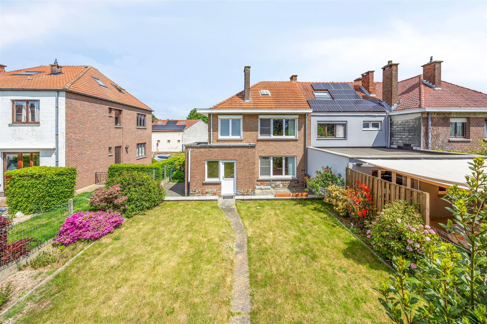 Ruime en zeer goed onderhouden 3-gevelwoning (EPC C) met garage foto 31