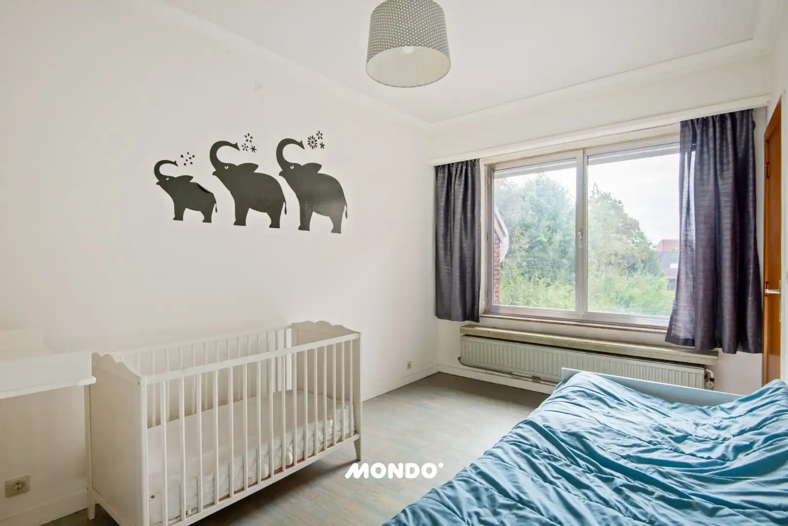 Ruime woning met 2 slaapkamers, garage, twee terrassen en tuin  foto 9