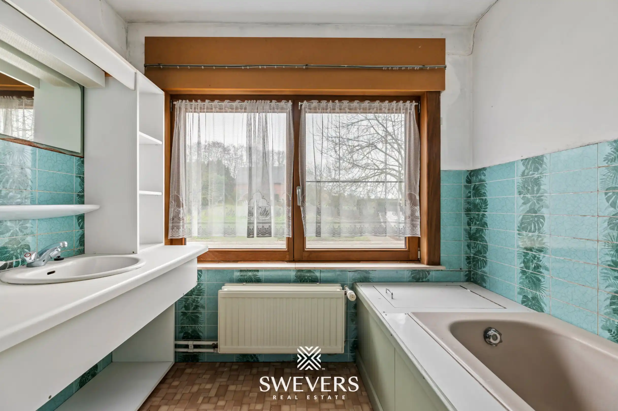 Te renoveren halfopen woning met ruim perceel in Diest foto 11