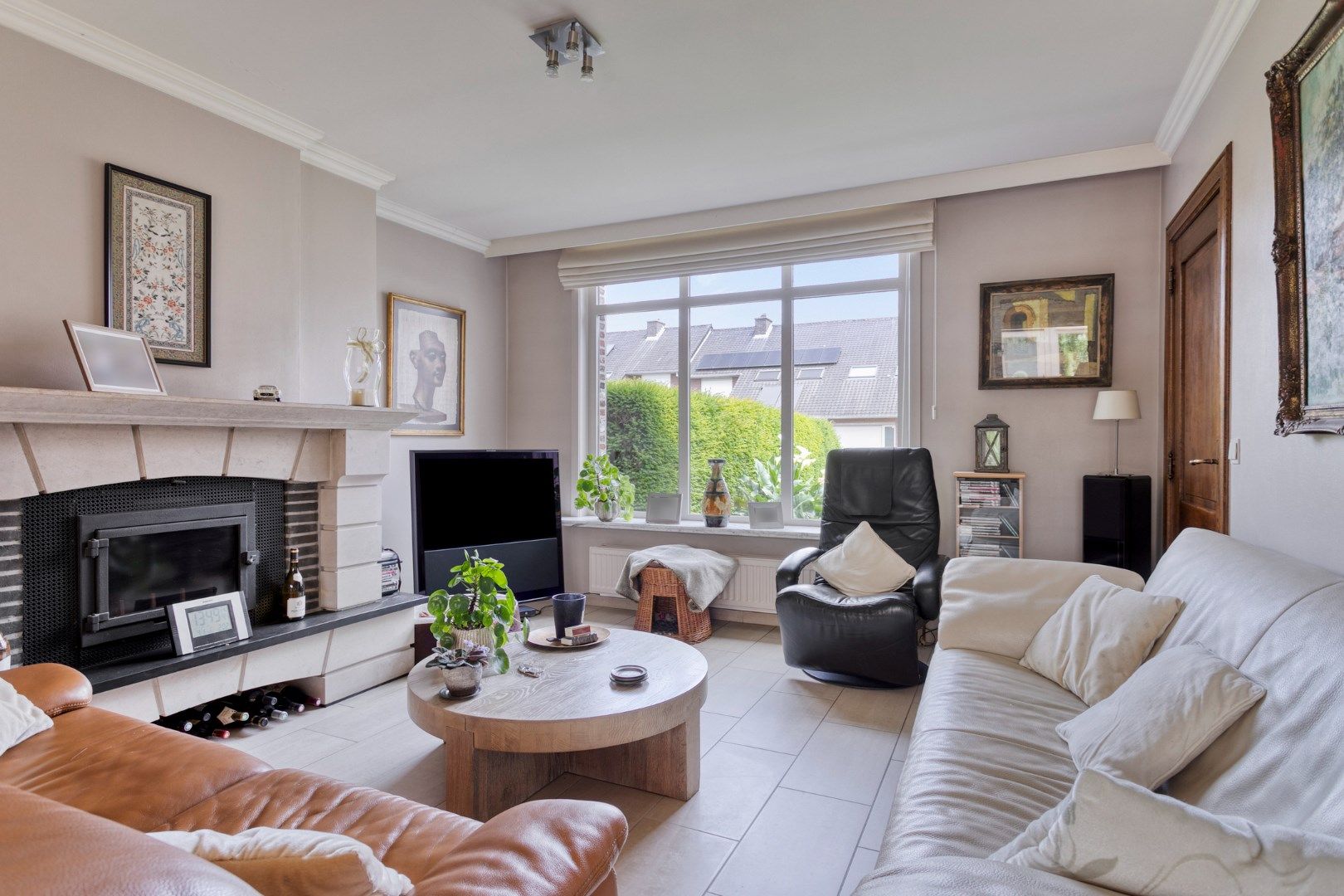 Mooie woning met 3 slaapkamers, garage en prachtige tuin! foto 3