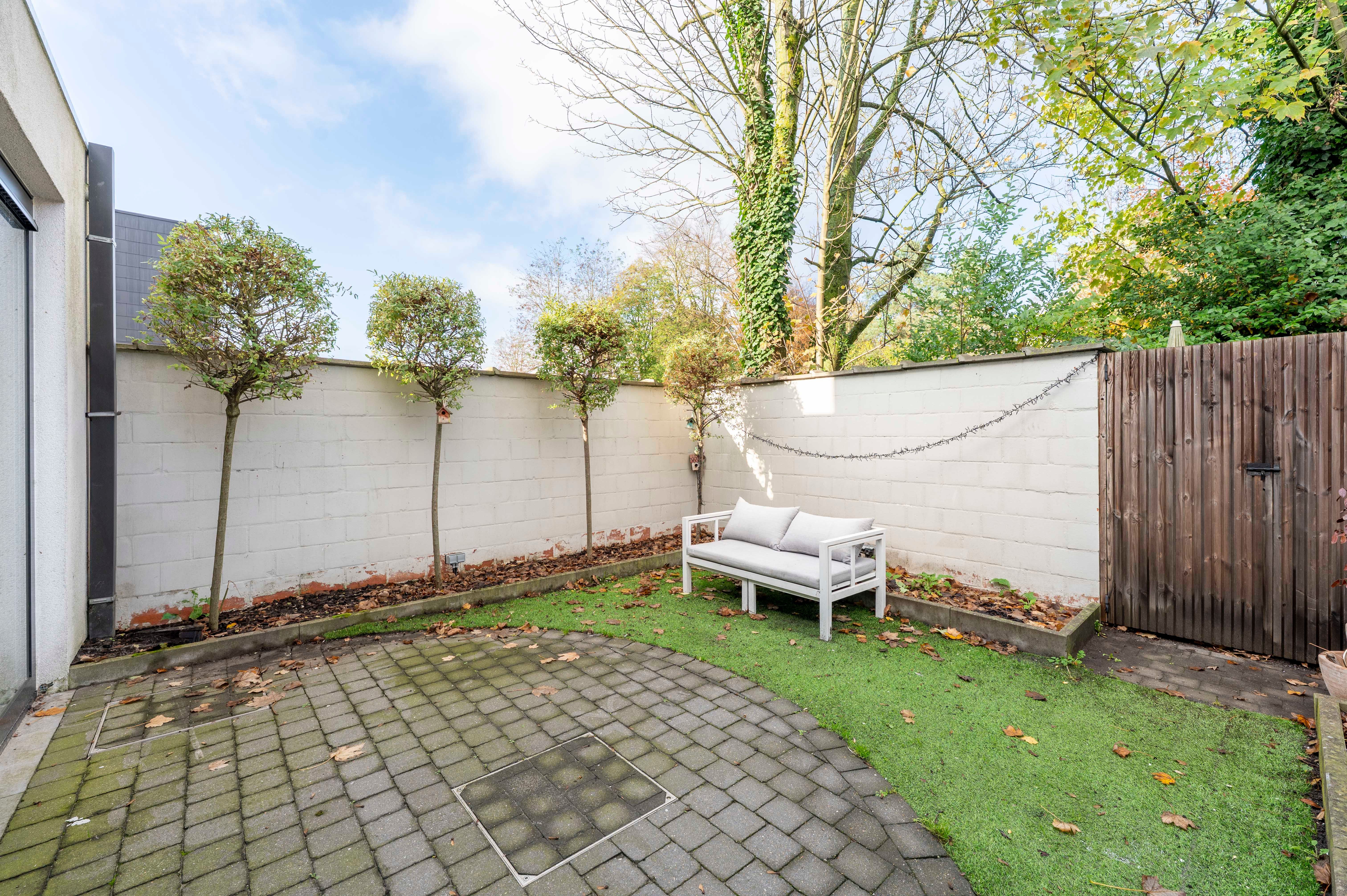 Moderne gezinswoning met gezellige stadstuin op de Lage Kaart te Brasschaat! foto 8