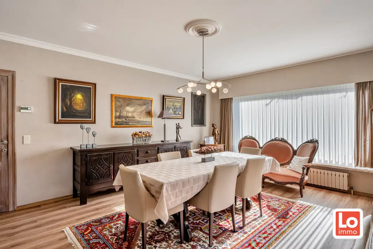 Degelijke open gelijkvloerse woning met inpandige garage en grote tuin op een groene toplocatie in Beervelde! foto 12