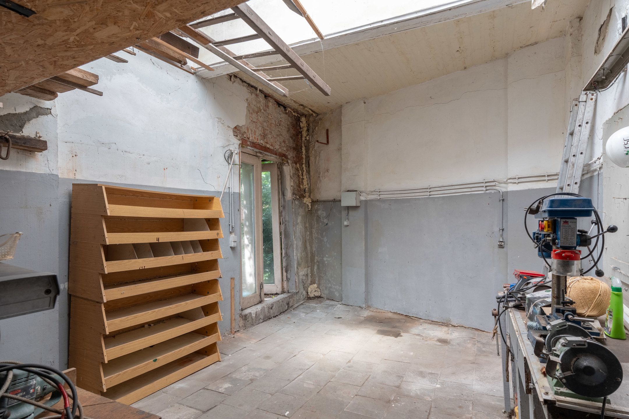 Te renoveren woning met toffe tuin en garage in het centrum foto 42