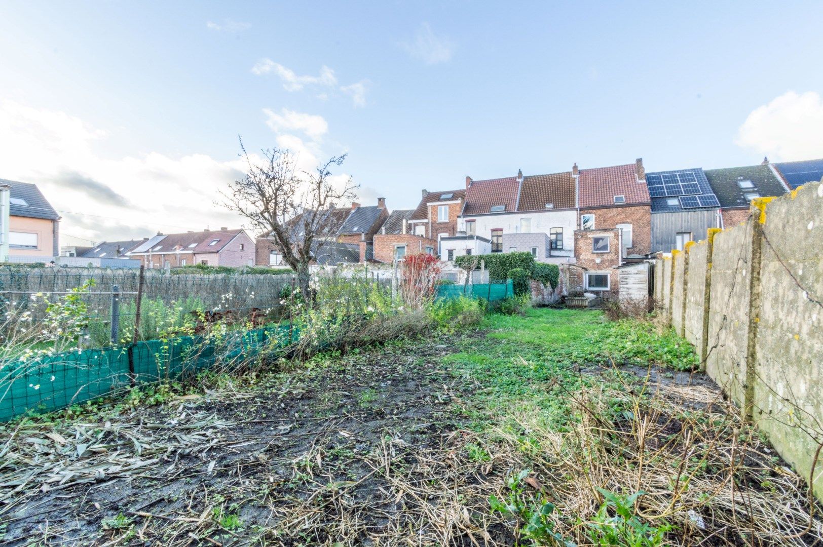 Ruime, te renoveren woning met 4 slaapkamers + zuid-tuin! foto 6