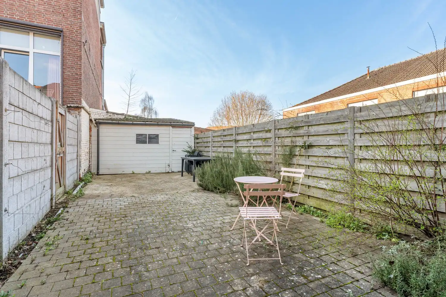 Goed gelegen halfopen bebouwing met 3 slaapkamers en een tuin met een poortje naar de straat te Wilsele! foto 8