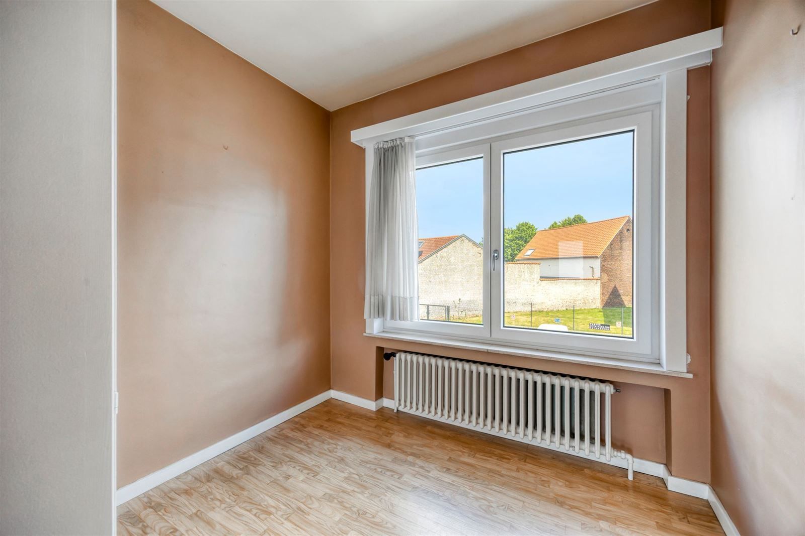 Ruime en zeer goed onderhouden 3-gevelwoning (EPC C) met garage foto 16