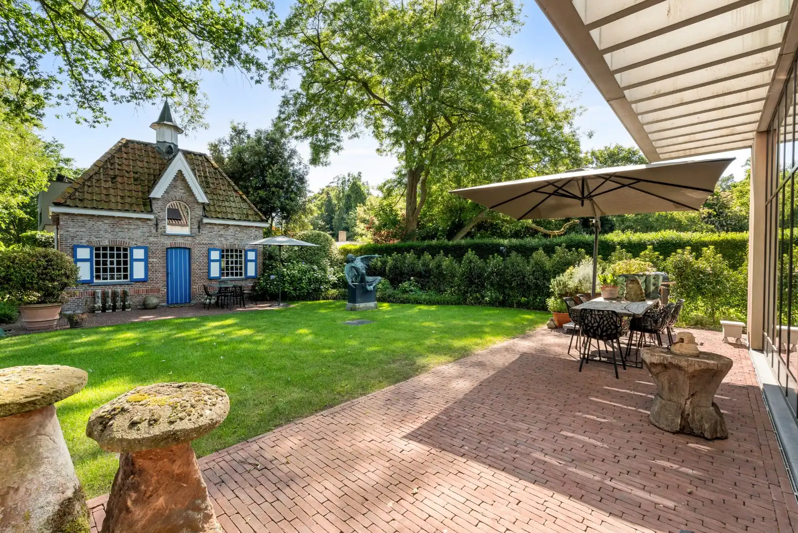 Stijlvolle en duurzame villa met unieke tuin nabij Brugge foto 24