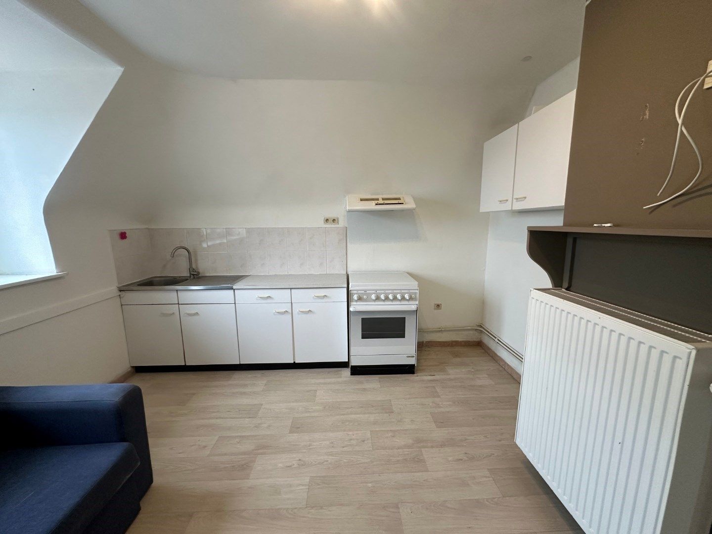 Te renoveren appartement met 1 ruime slaapkamer en mogelijkheid tot aankoop garage in gebouw foto 6