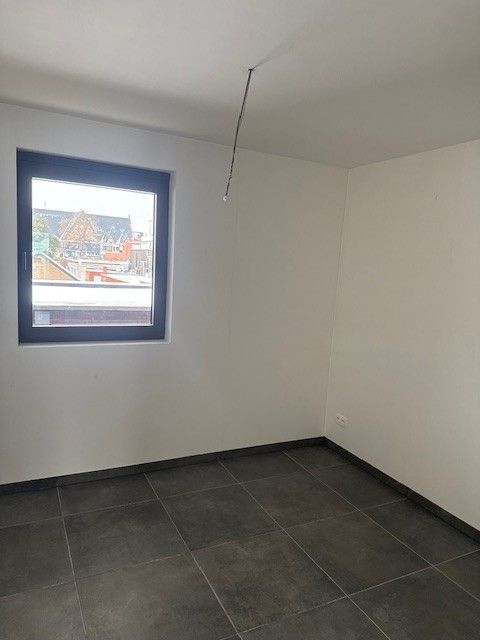 Nieuwbouw energiezuinig appartement met 2 slaapkamers, terras en parking in centrum Houthalen foto 9