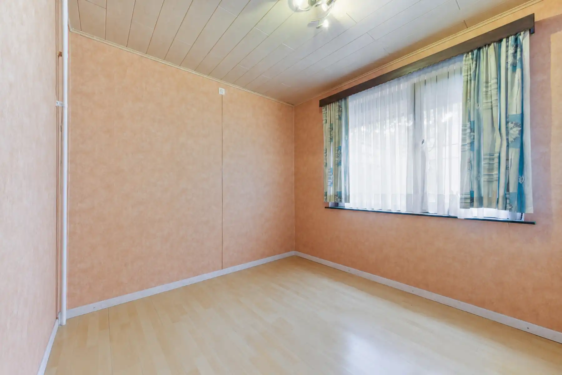Charmante gelijkvloerse woning met 3 slaapkamers, garage en zonnige tuin. foto 19
