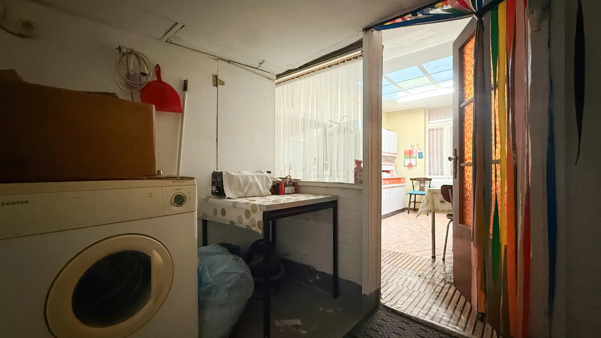 Op te frissen rijhuis met 3slpk + tuin in Sint-Truiden! foto 14