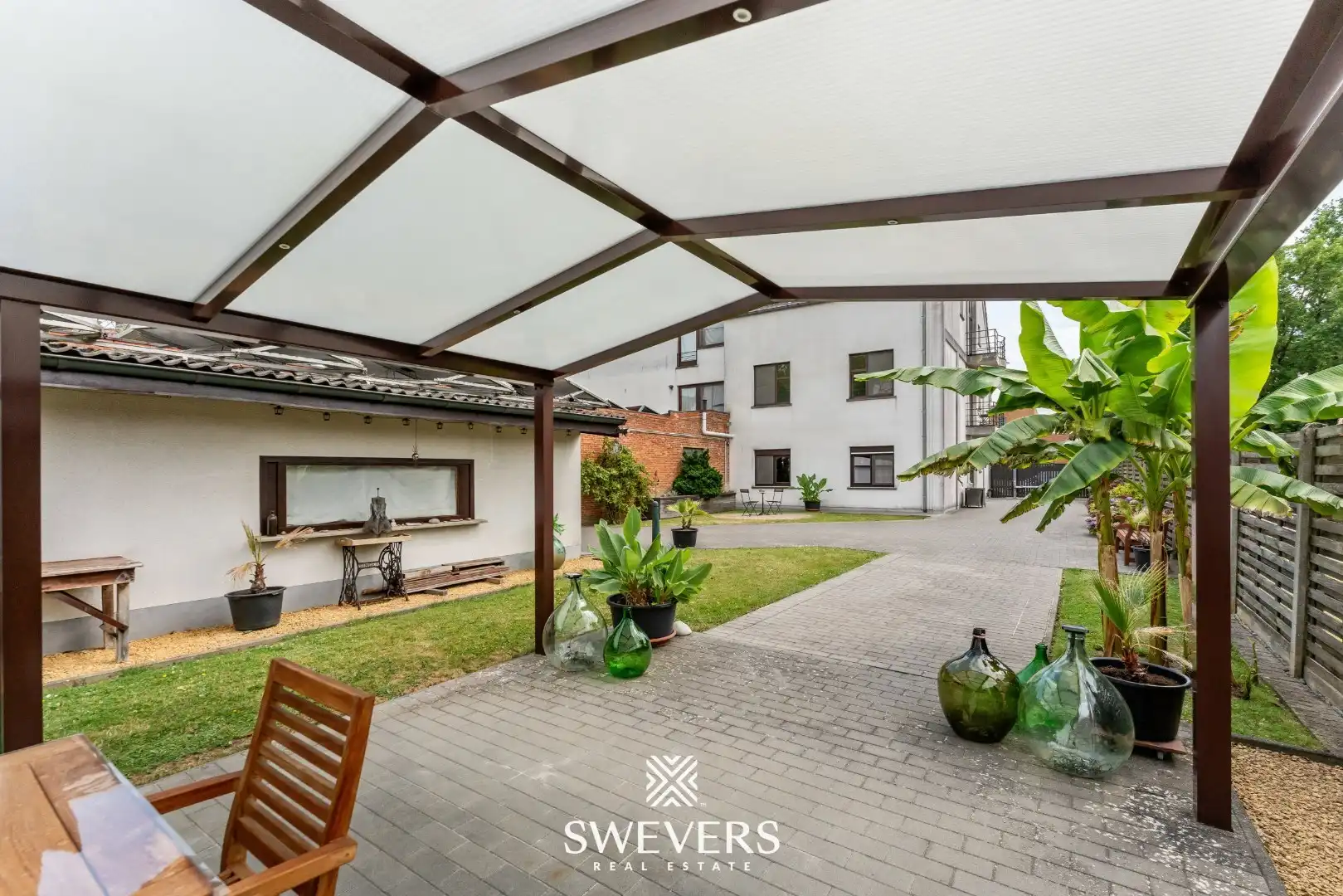 Gelijkvloers, ruim appartement met grote tuin te Koersel foto 21