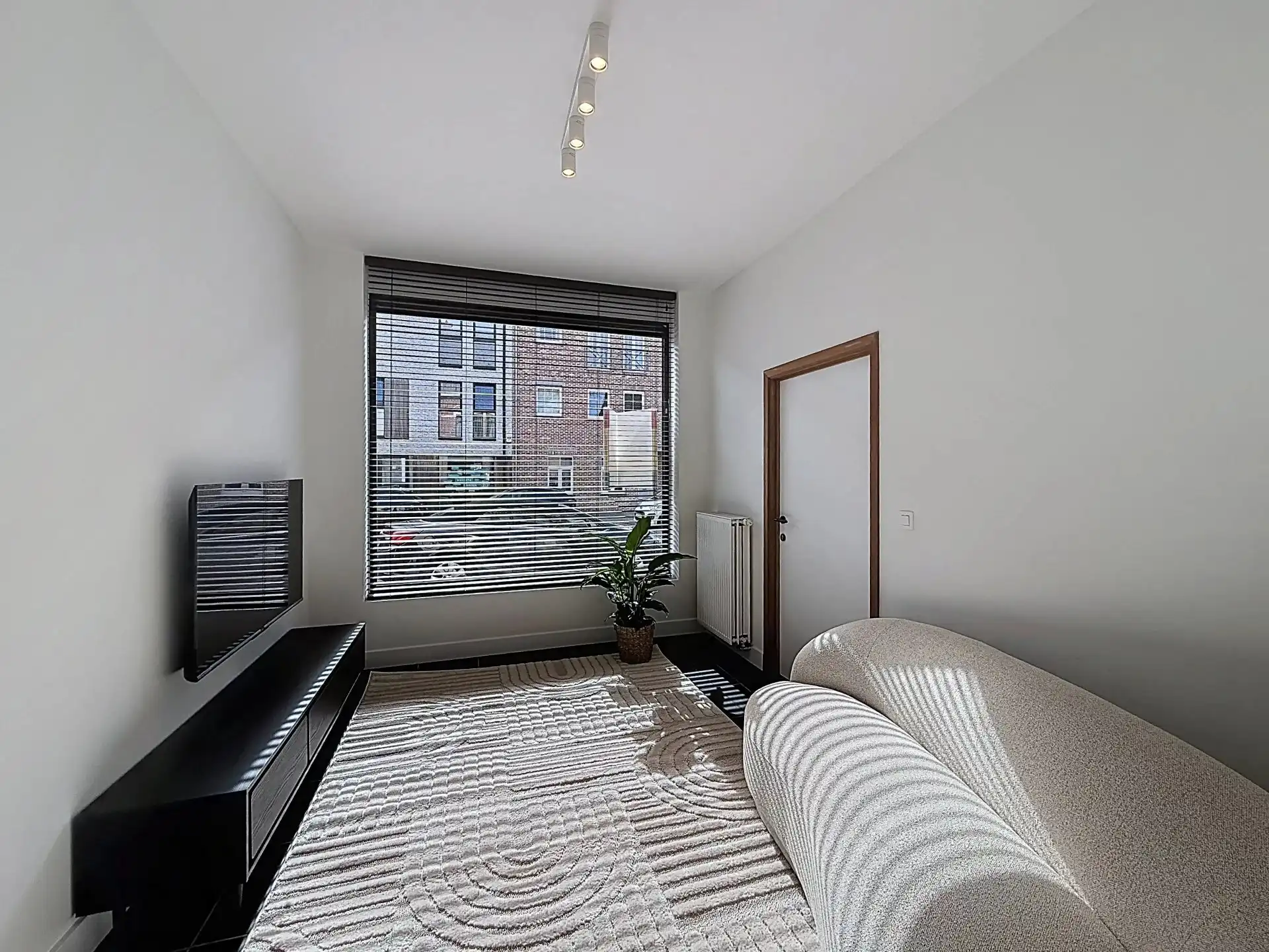 Zeer gezellig gelijkvloers appartement met 1 (mog. 2) slaapkamers, tuin, terras en staanplaats. foto 4