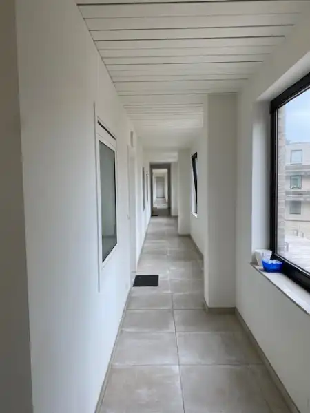 Recent ideaal gelegen volledig gerenoveerd appartement HARTJE Geel 2 slpk, met autostaanplaats foto 15