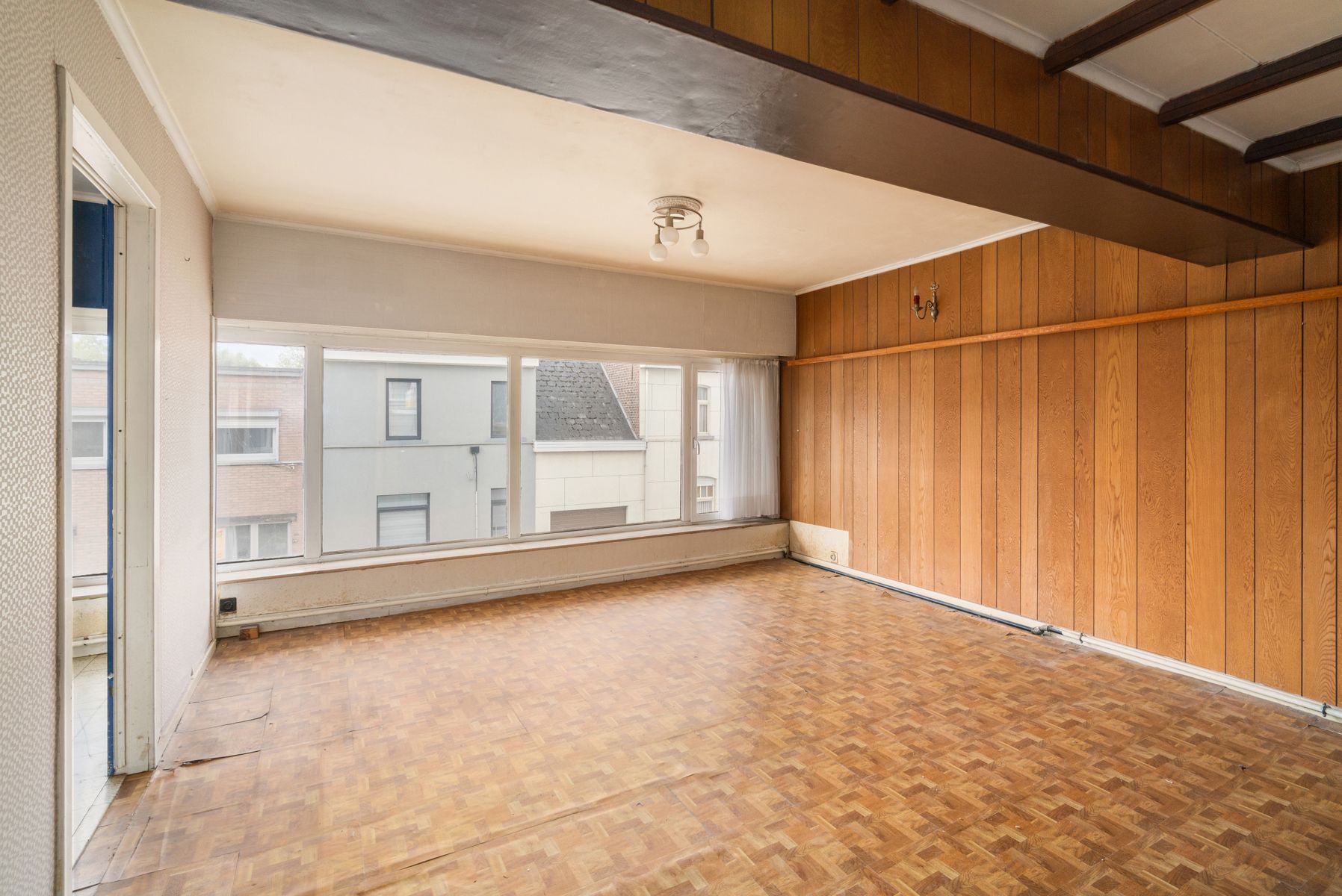 Te renoveren 2-slaapkamer appartement in het centrum van Erembodegem foto 2