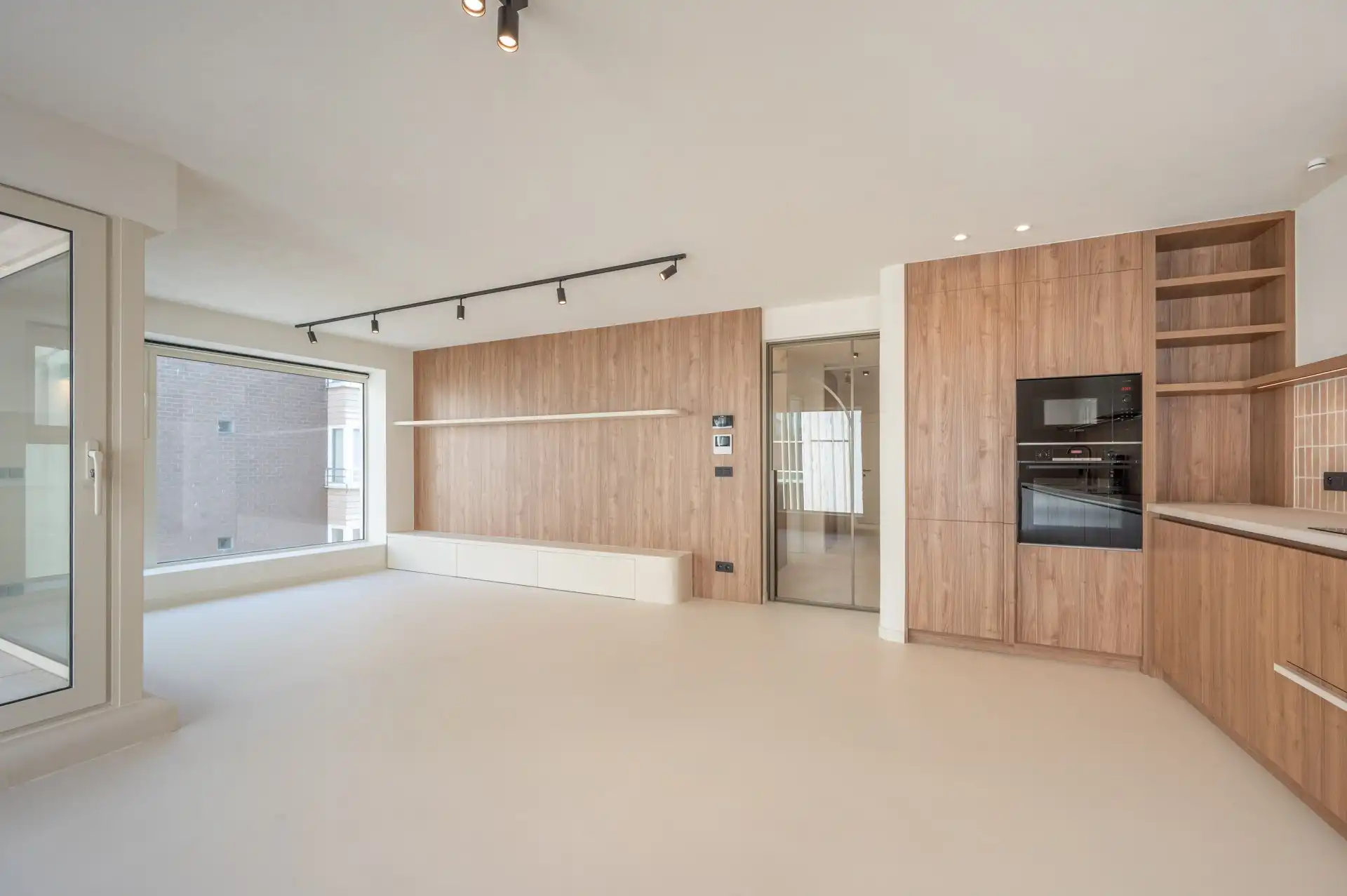 Volledig vernieuwde opbrengsteigendom met drie appartementen en verhuurd handelsgelijkvloers foto 7