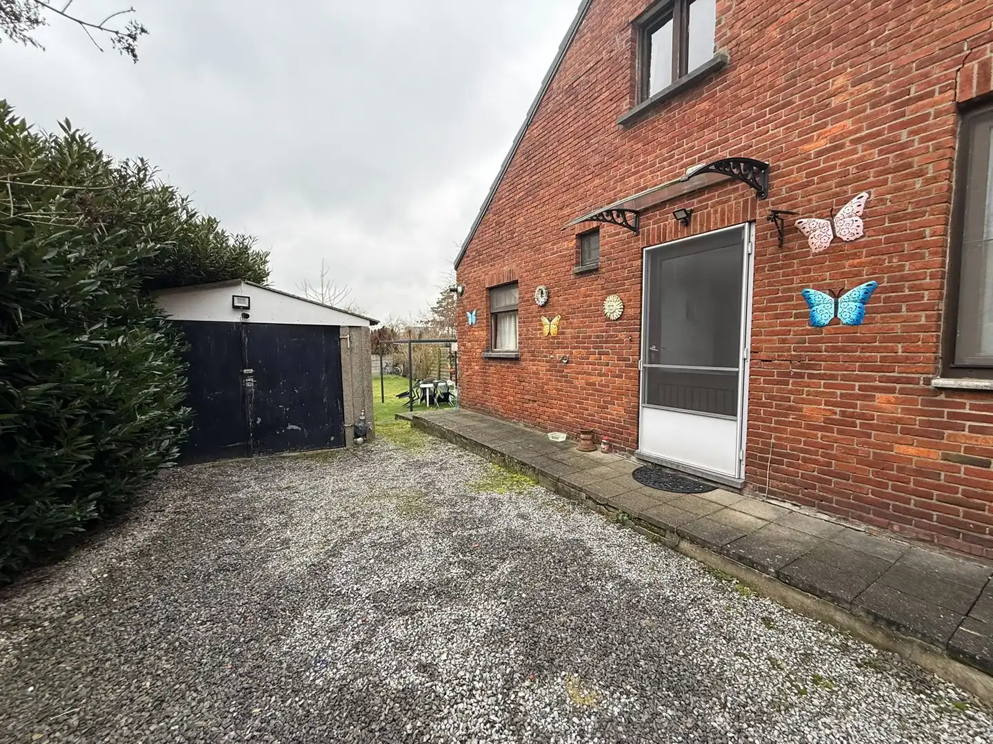 Opbrengsteigendom bestaande uit 2 halfopen woningen met garage en tuin te Hechtel. foto 38