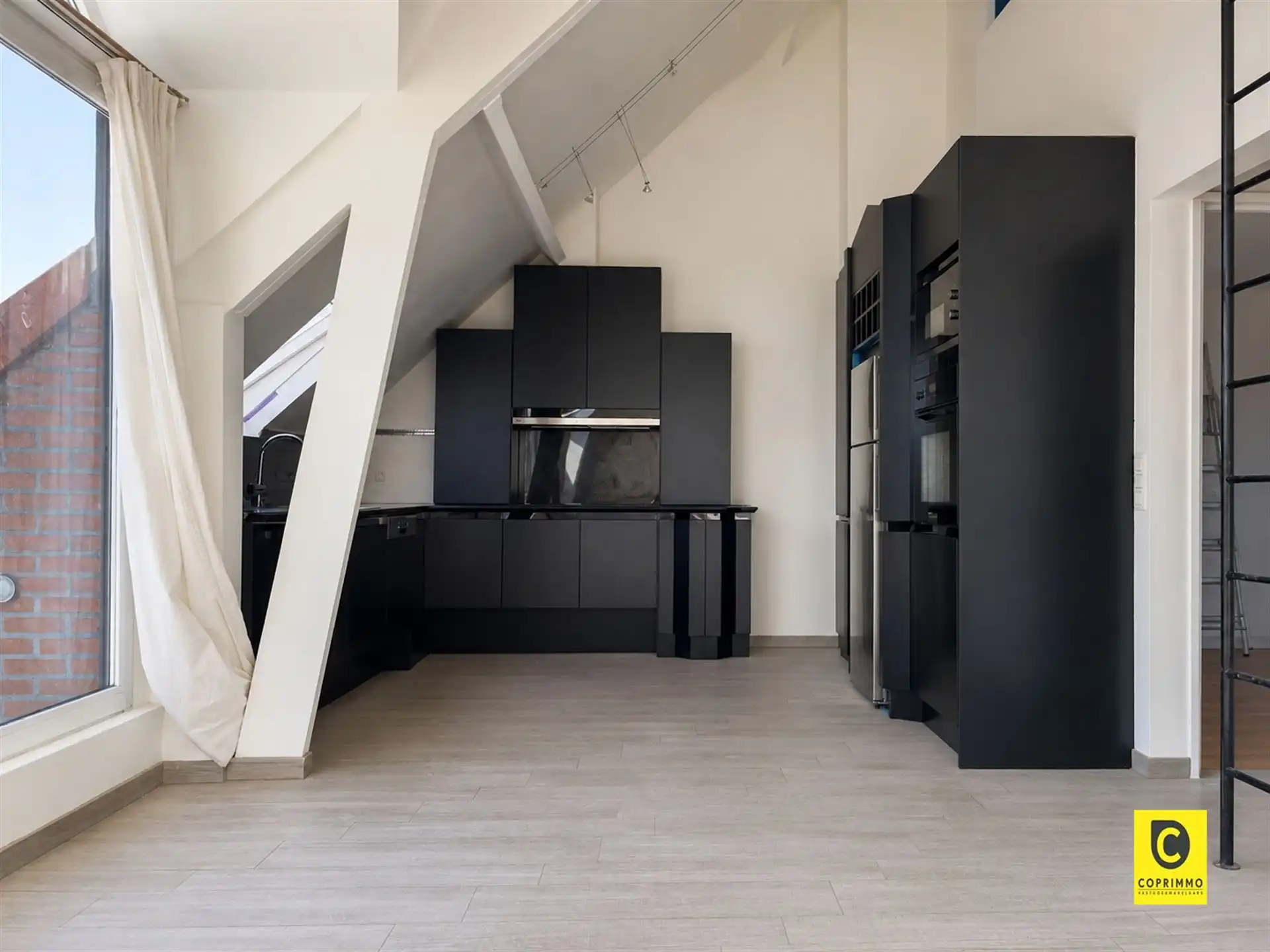 Uniek dakappartement met groot terras foto 4