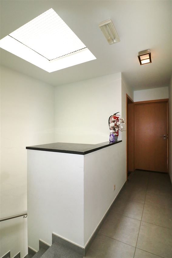 Duplex met 2 grote slpk, zuidterras, nabij station foto 37