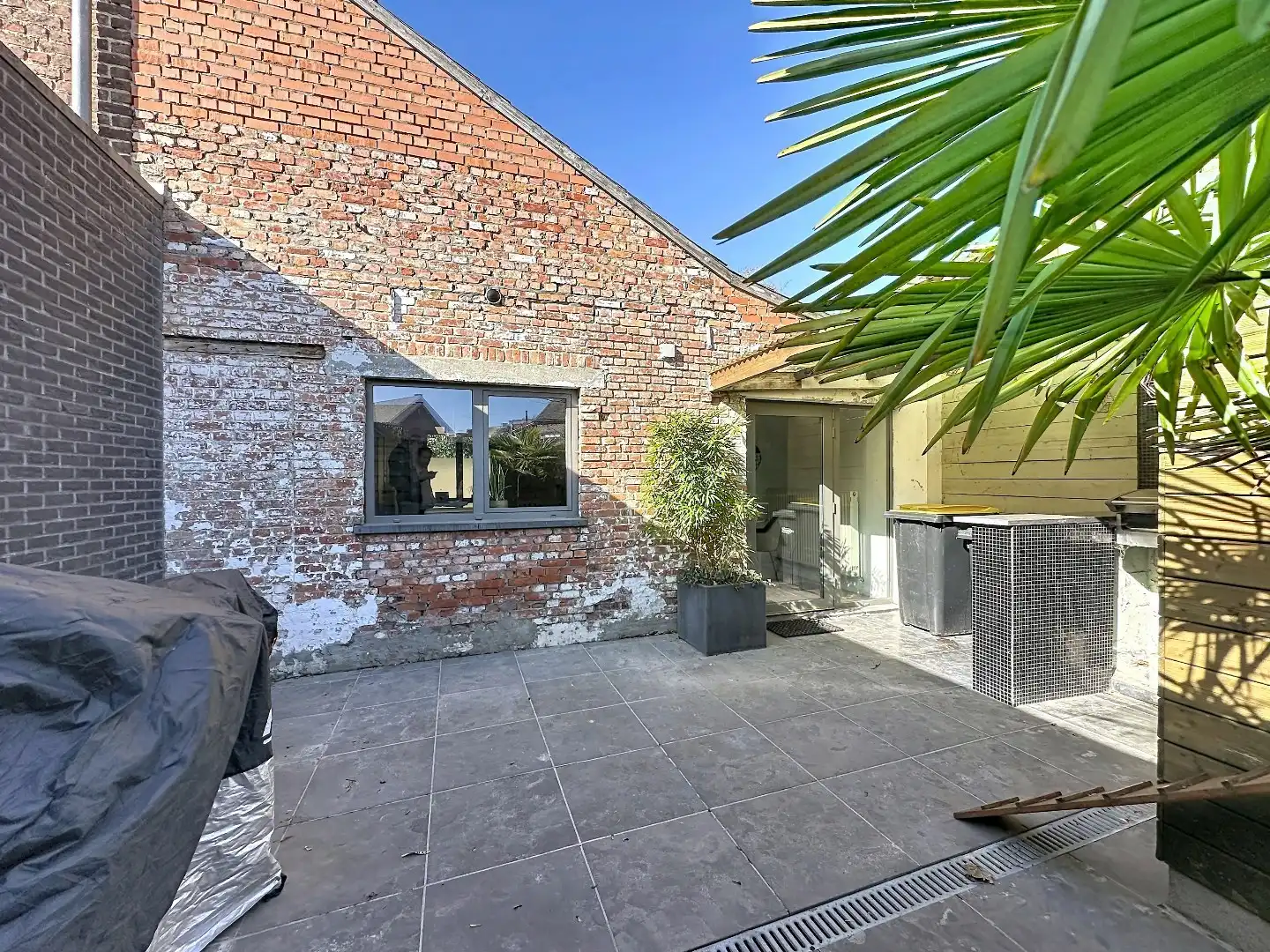 Instapklaar huisje met zonnig terras in Herent foto 17