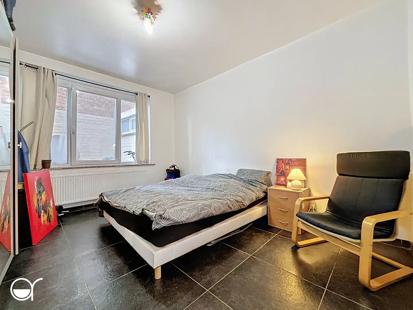 Gelijkvloers appartement met koer op gegeerde locatie foto 16