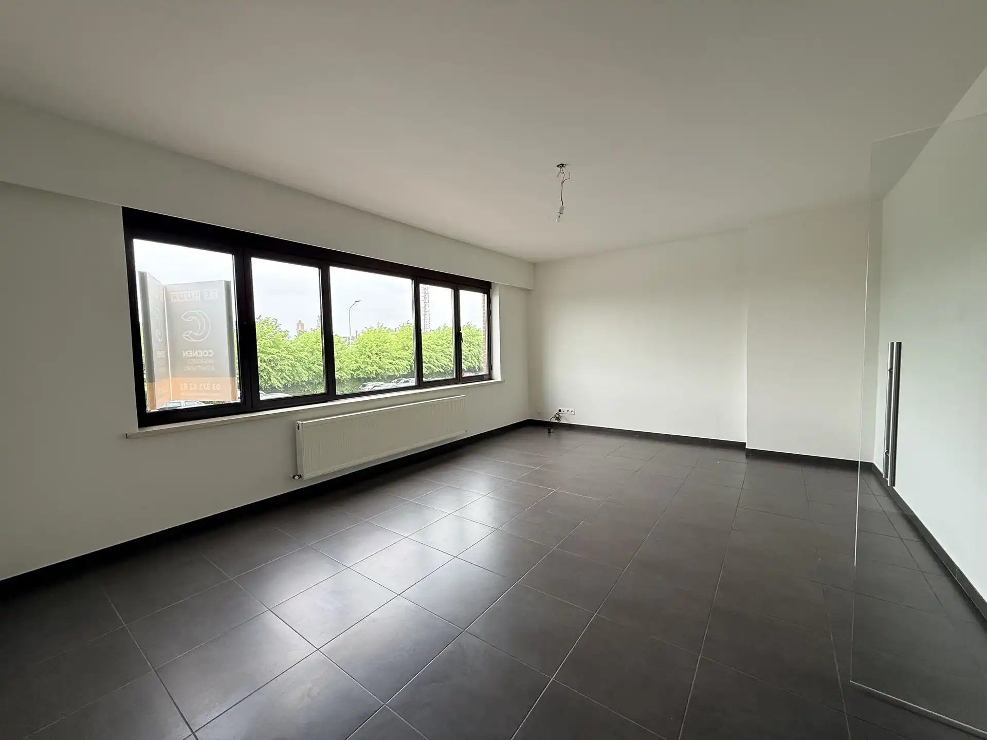 Ruim appartement met 2 slpk's en bew. opp. van 92 m² op centrale ligging te Lier! foto 4