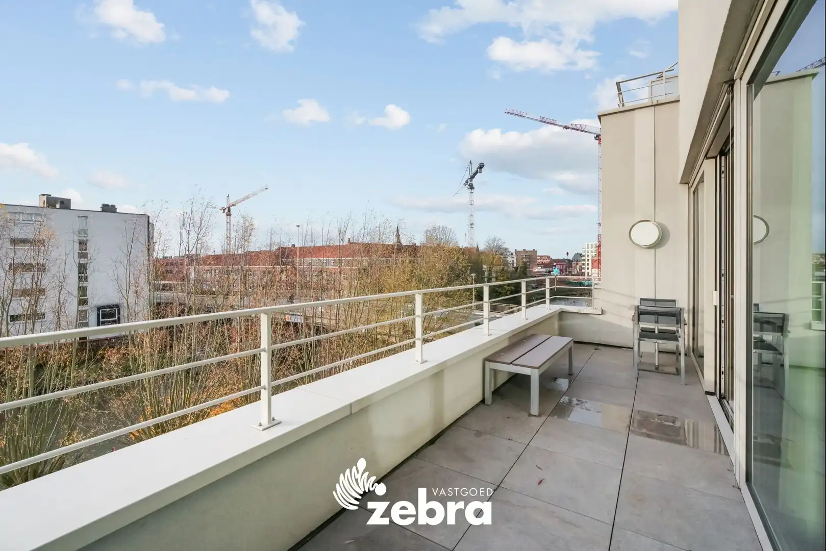 Moderne serviceflat met prachtig zicht op de Leie en autostaanplaats te Deinze! foto 14