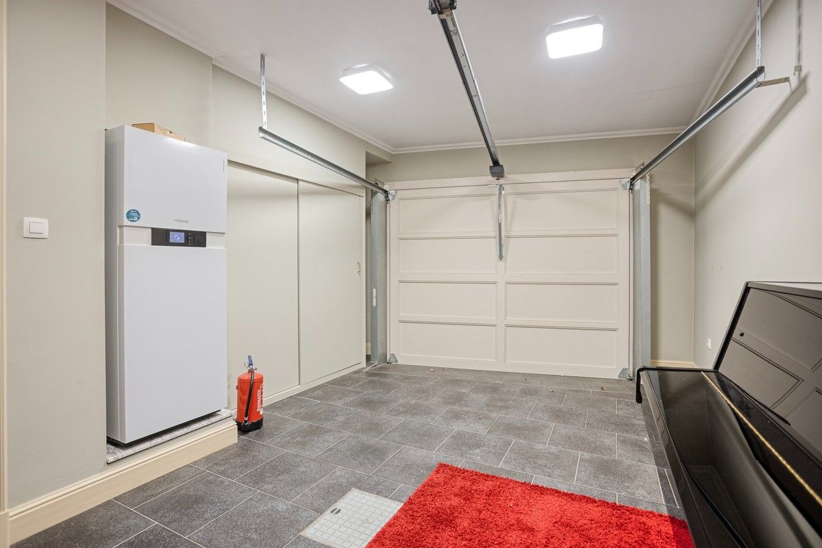 Charmante, volledige instapklare woning met twee slaapkamers en een inpandige garage in hartje Tongeren foto 13