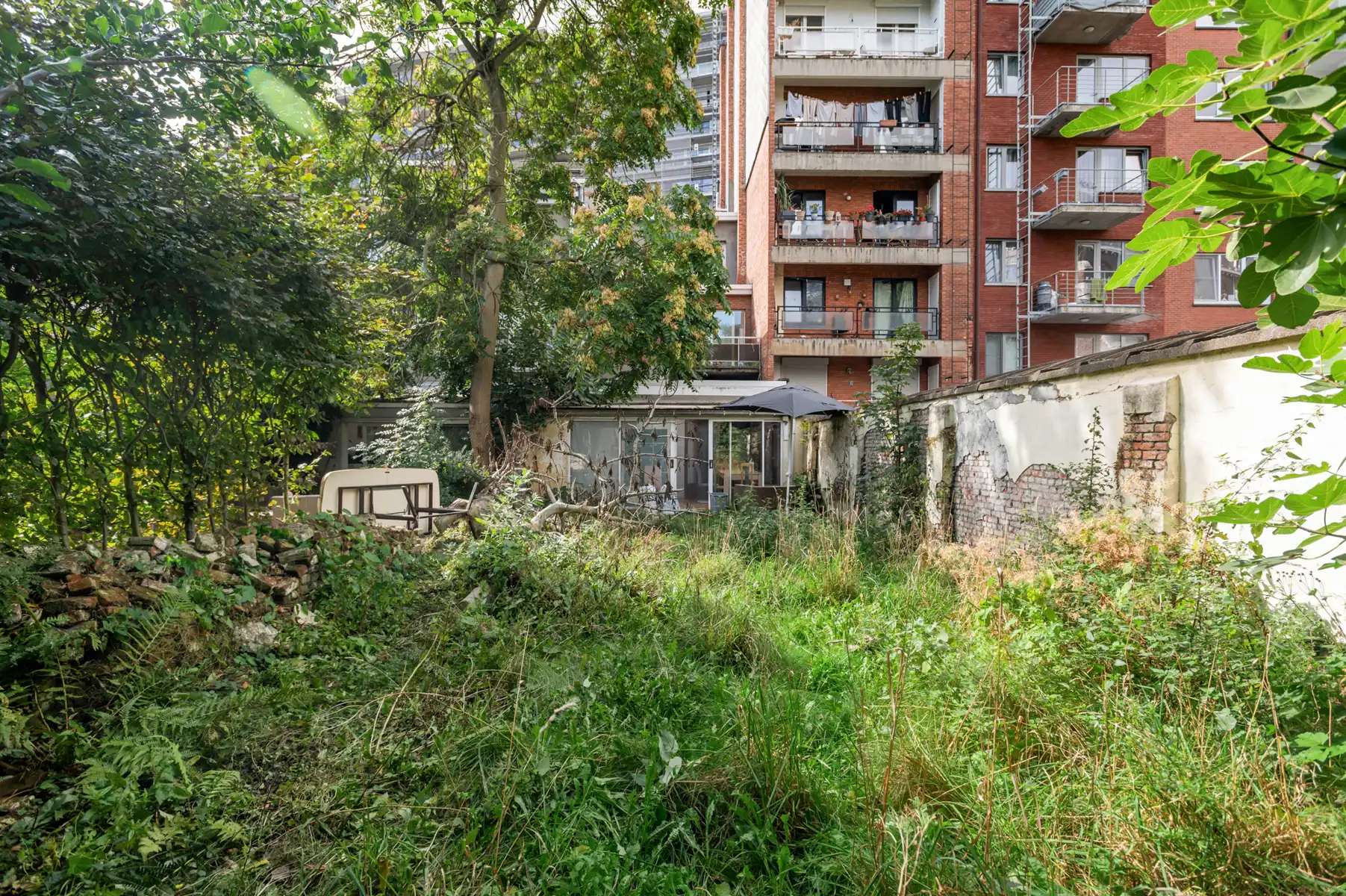 Handelshuizen met tuin en stabiele huuropbrengst te koop foto 19