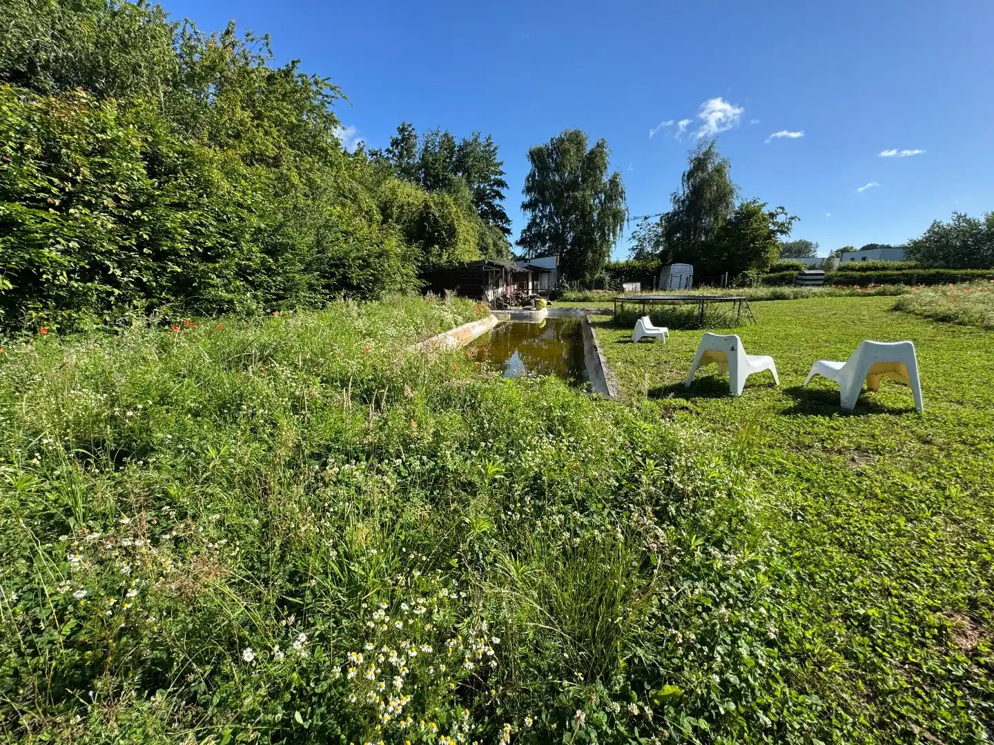 TE KOOP: Ruime architectenwoning in residentiële wijk 'De Piste'. Rustig, groen en zeer bereikbaar perceel van 1800m²! foto 22