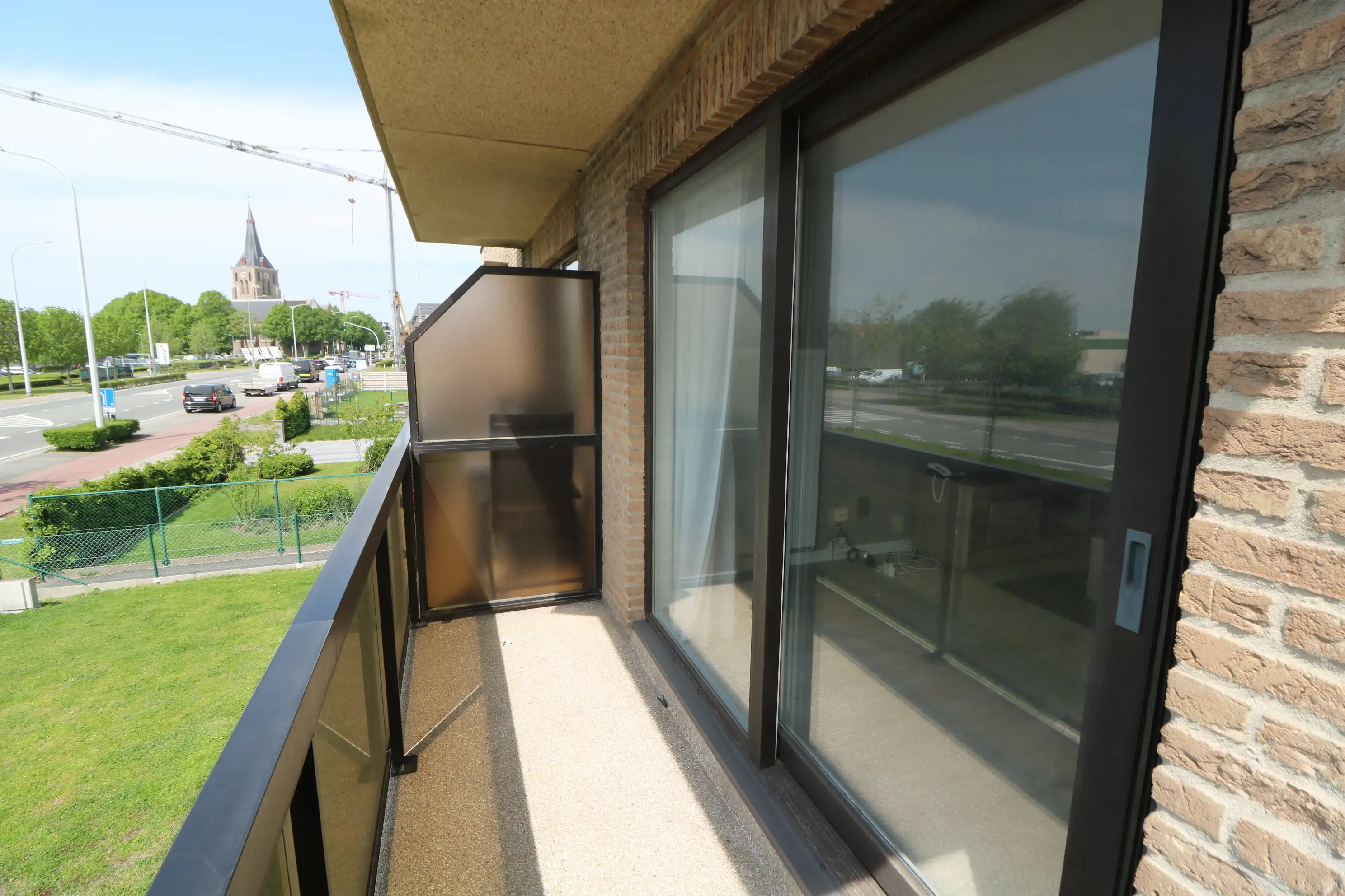 Ruim en lichtrijk hoekappartement met 2 slaapkamers, terras én garage foto 14
