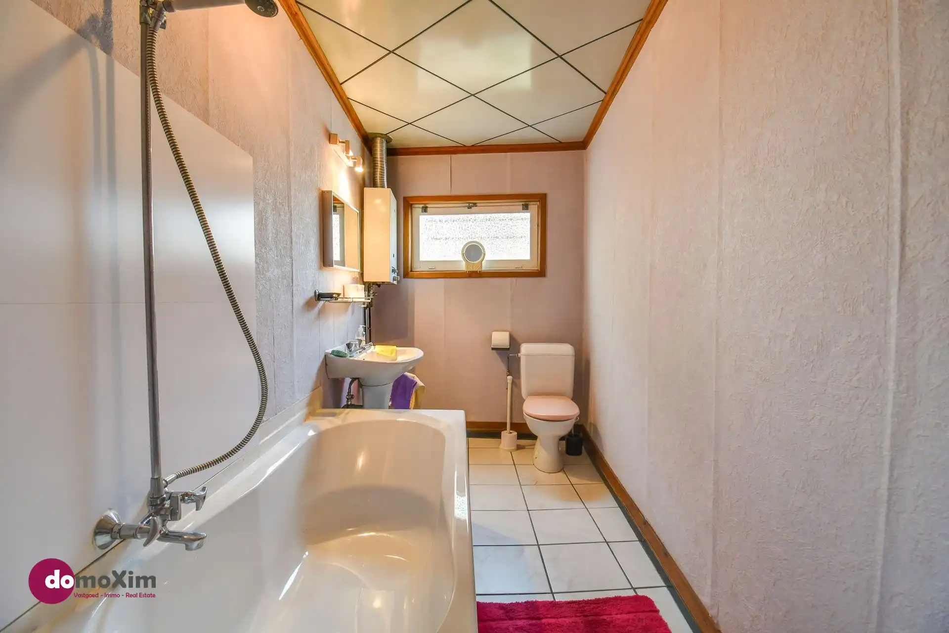 Te renoveren stadswoning met zuid-gerichte tuin en garage foto 9