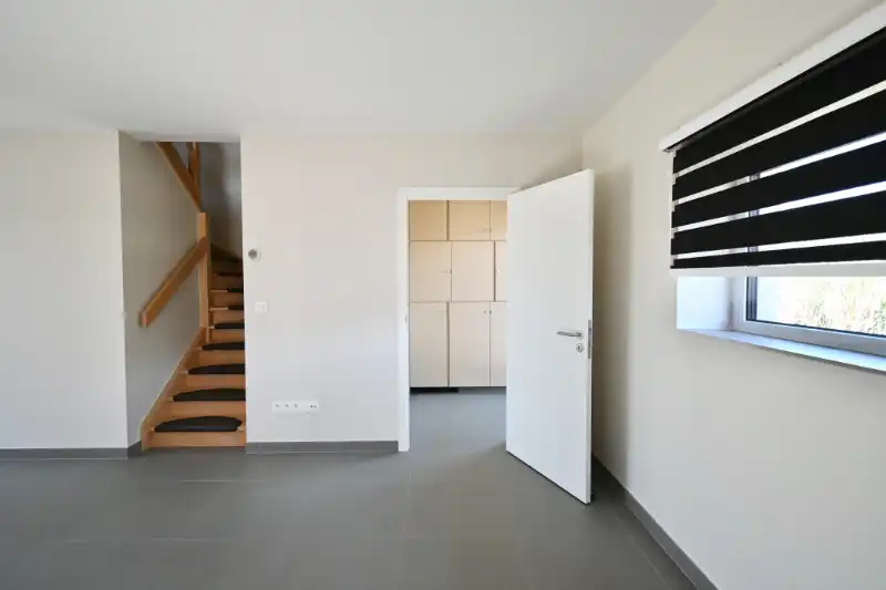 Moderne passiefwoning met 3 slaapkamers, garage en tuin op toplocatie in Deinze (EPC A) foto 4