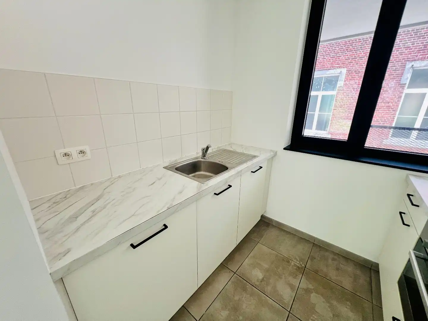 Prachtige rijwoning in centrum met 2 slpks en terras foto 7